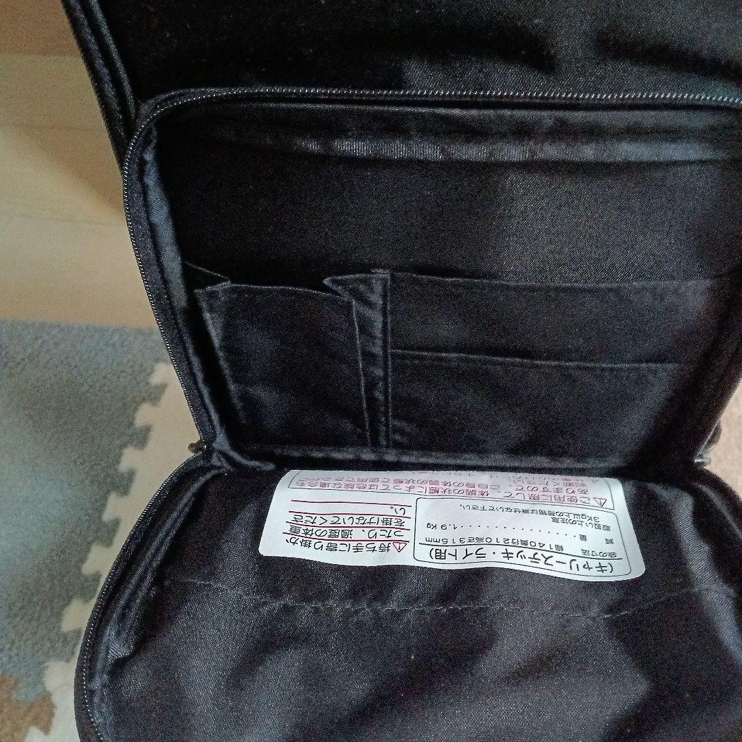 黒いナイロン製キャリーカート 杖代わりに利用