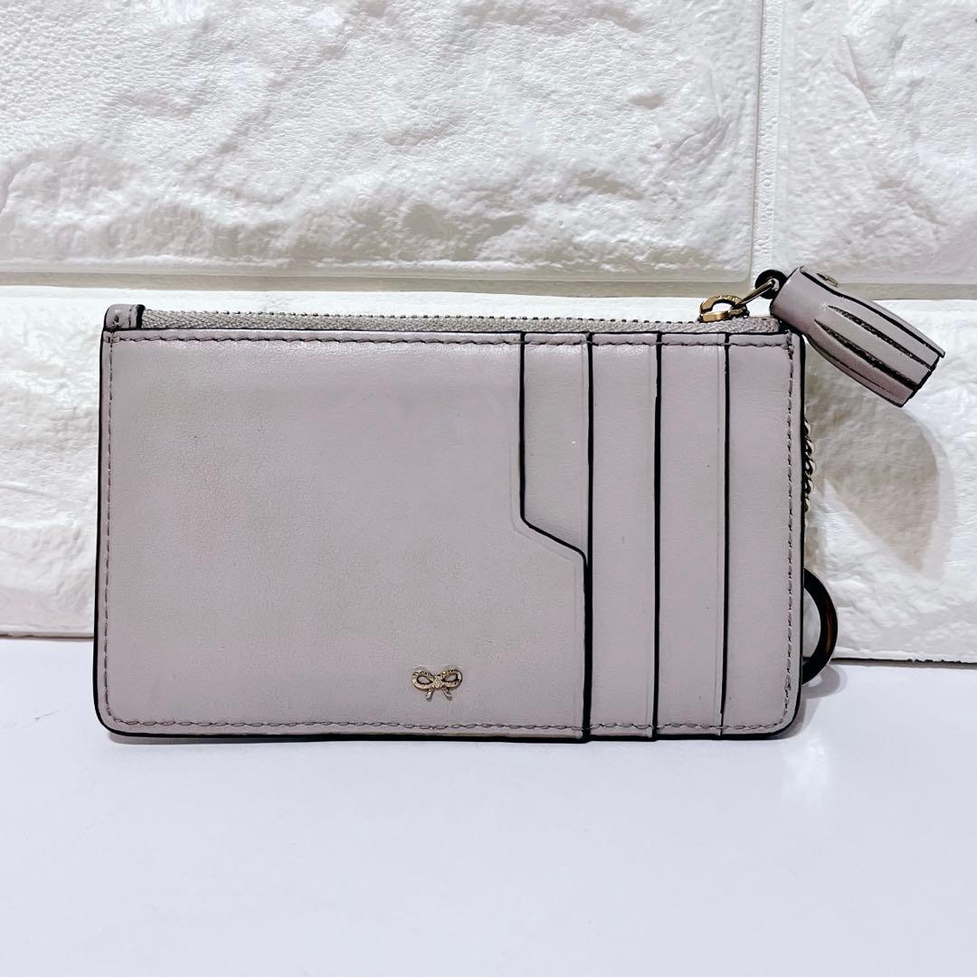 ANYA HINDMARCH スマイリーウィンキー パンチングレザーケース