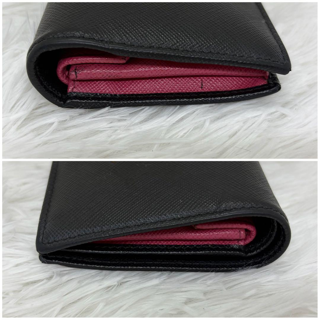 美品✨️プラダ 二つ折り財布 レザー バイカラー　サフィアーノ 黒 ピンク