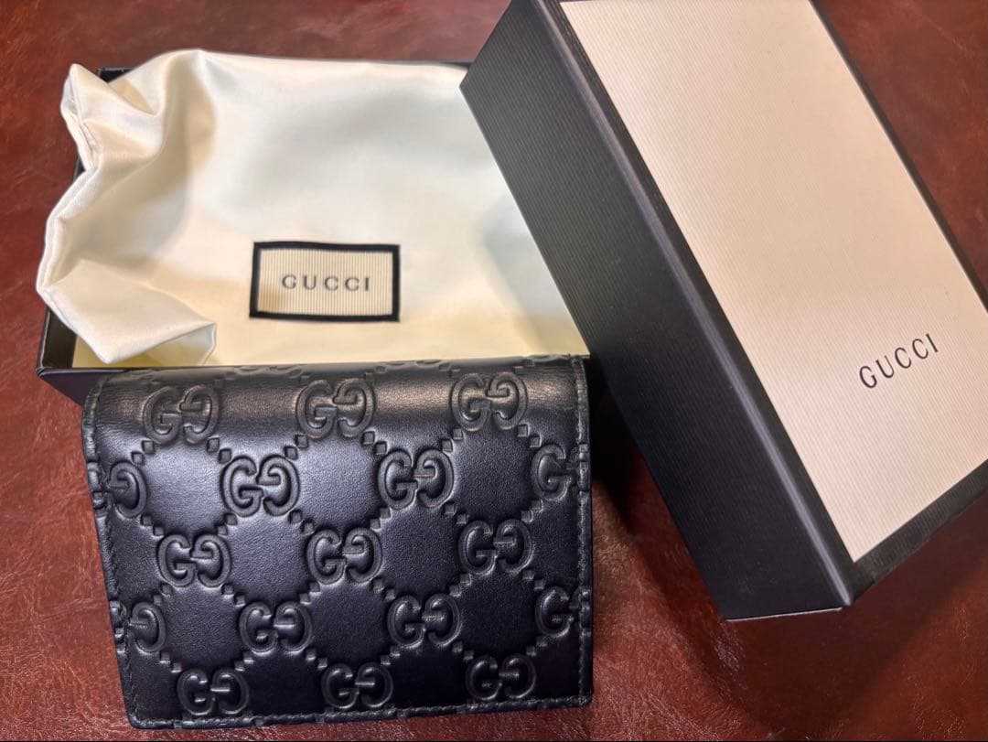 さ*ん様 即決￥20600 GUCCI 二つ折り財布 ブラック レザー
