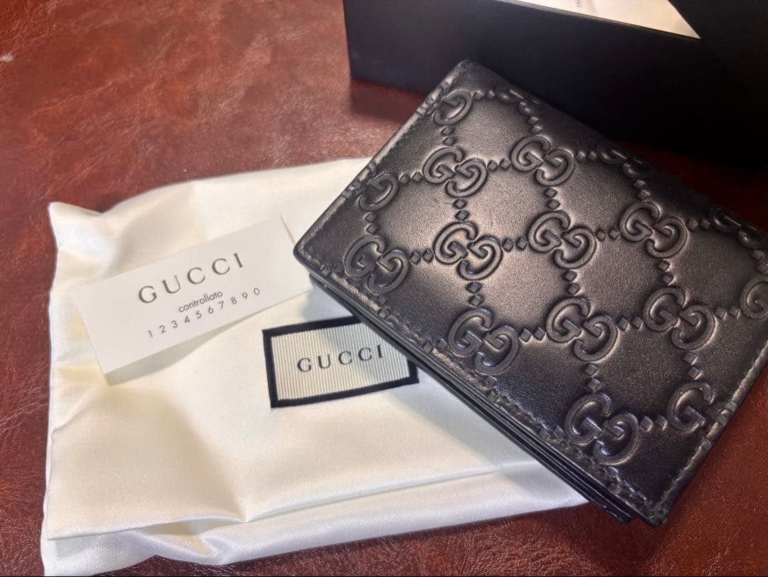 さ*ん様 即決￥20600 GUCCI 二つ折り財布 ブラック レザー