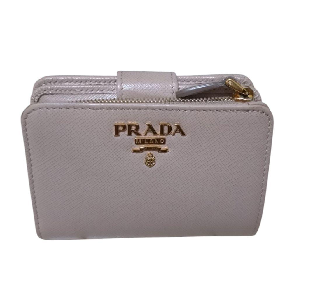 プラダ 2つ折り財布 金ロゴ バイカラー サフィアーノ