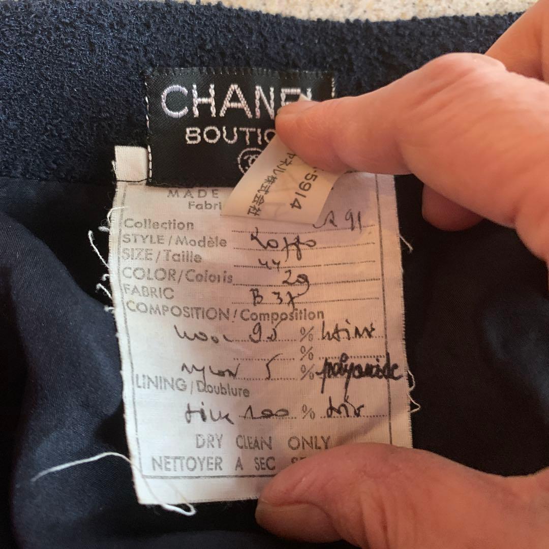 CHANEL シャネル　スカート　ツイード　ブラック CHANELのボタン付き