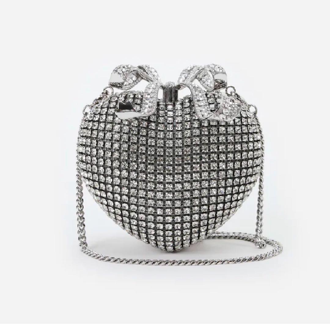 期間限定値下げsilver crystal heart clutch