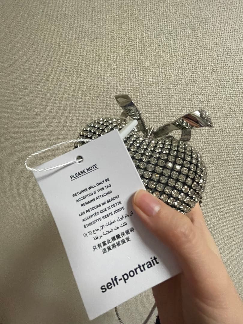 期間限定値下げsilver crystal heart clutch