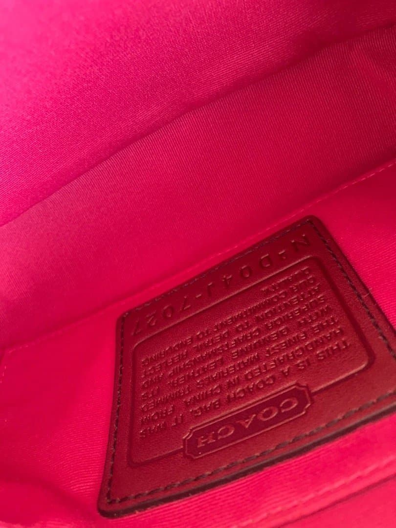 コーチ　アクセサリーポーチ　ミニバッグ　シグネチャー7027