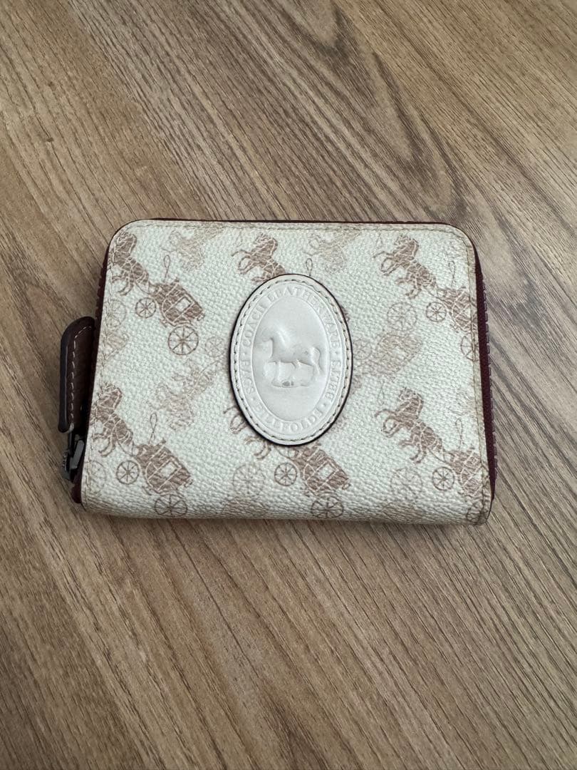大幅値下げ中‼️‼️COACH 二つ折り財布 馬車プリント