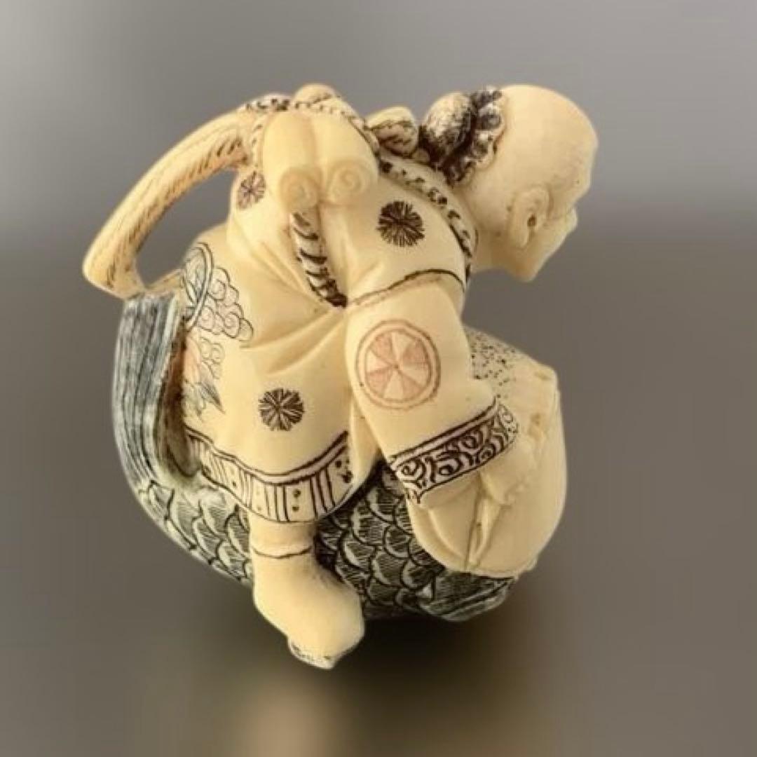 時代物 置物 魚にまたがる人物