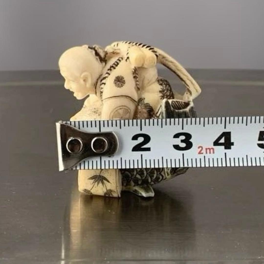 時代物 置物 魚にまたがる人物