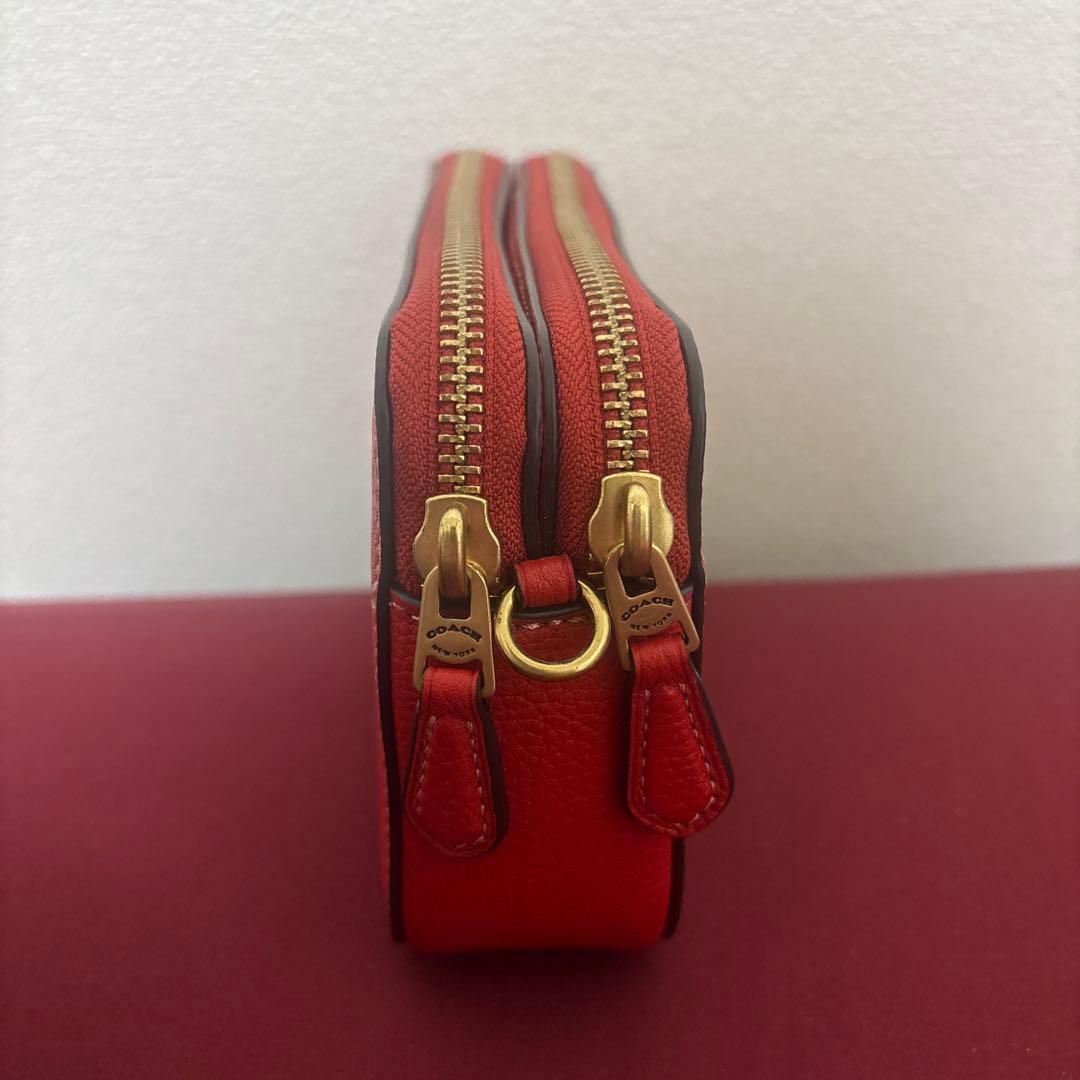 COACH レッド恐竜刺繍ポーチ