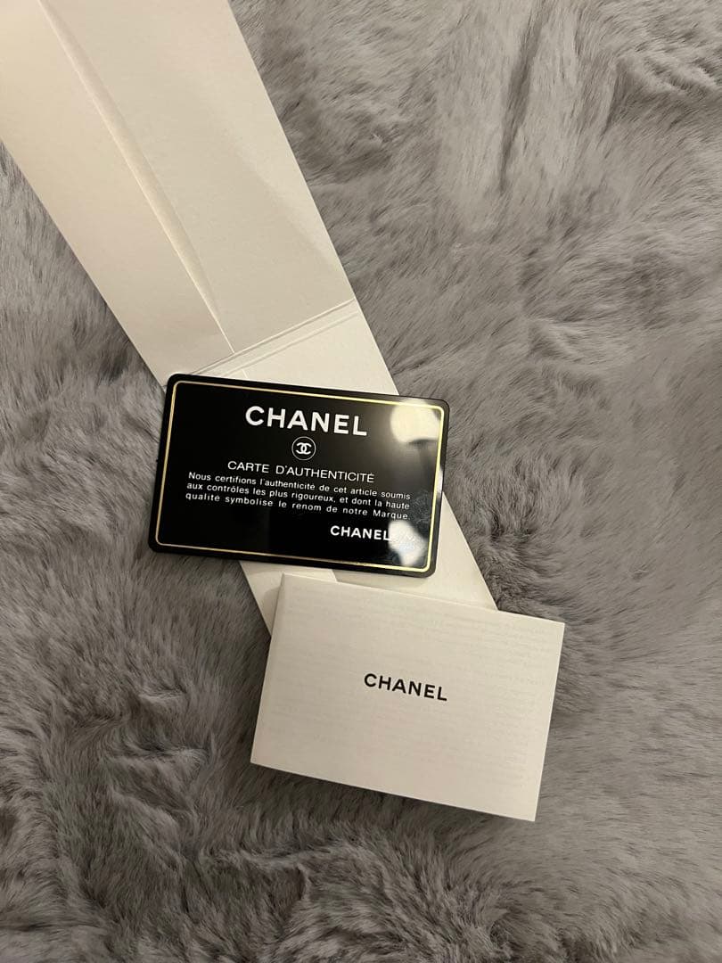 CHANEL 花柄エンボス 三つ折り財布