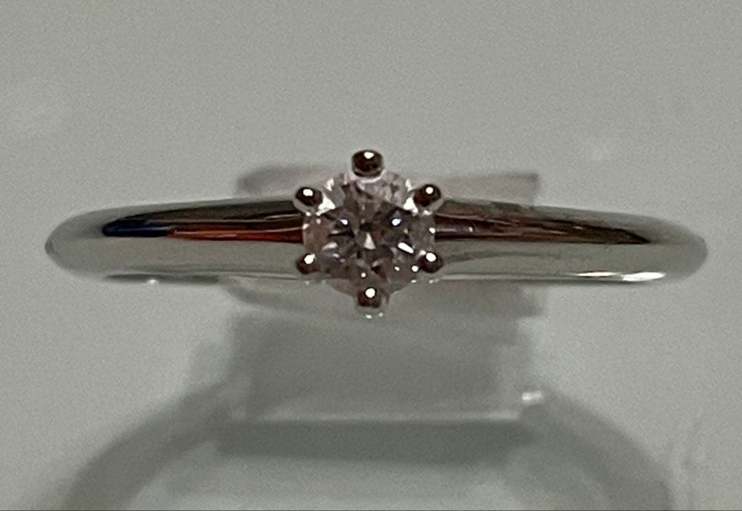 新品仕上げ　TIFFANYソリティアリング 0.18ct 13号弱　鑑定書付き