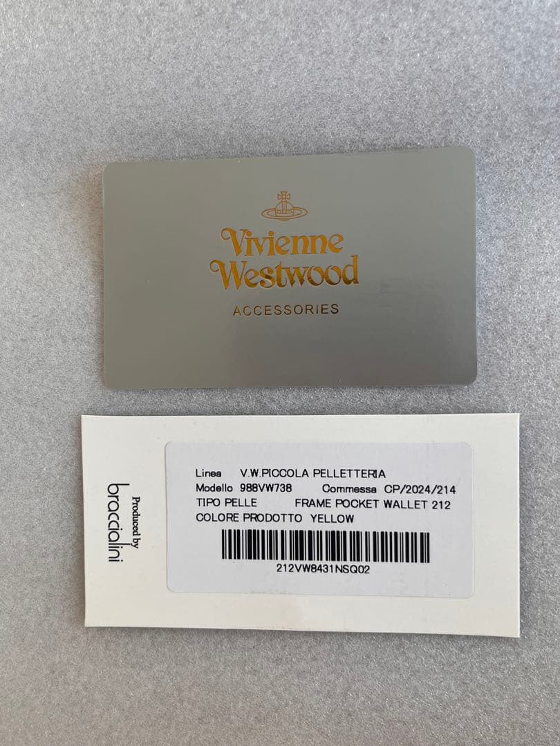 新品未使用品 Vivienne Westwood 二つ折り財布 イエロー