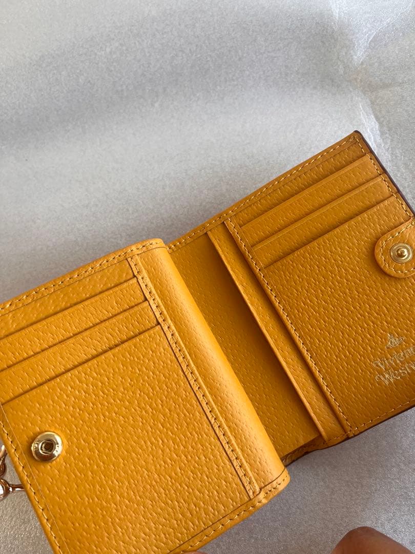 新品未使用品 Vivienne Westwood 二つ折り財布 イエロー