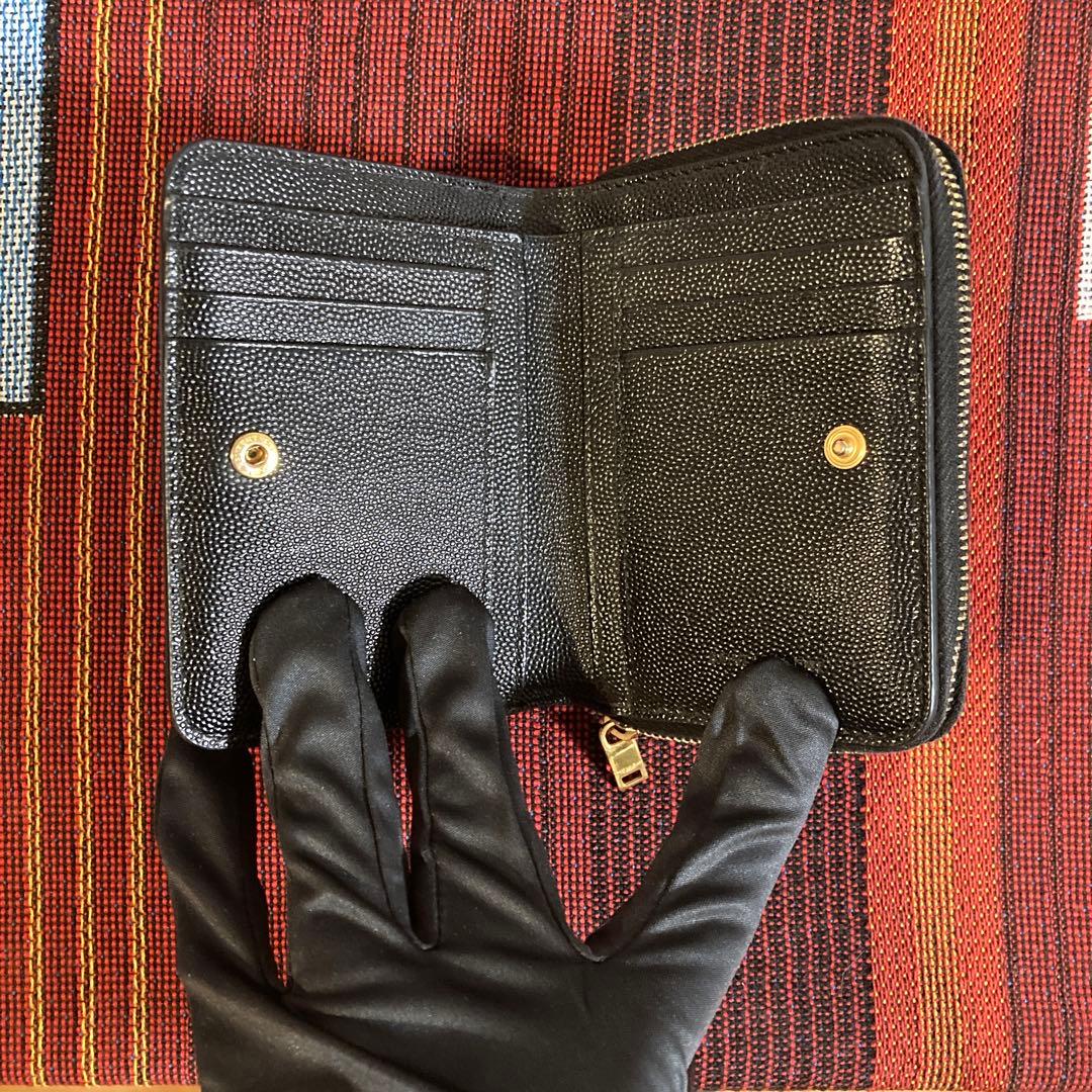 サンローラン 折り財布 ラウンドファスナー カサンドラ ロゴ 総柄