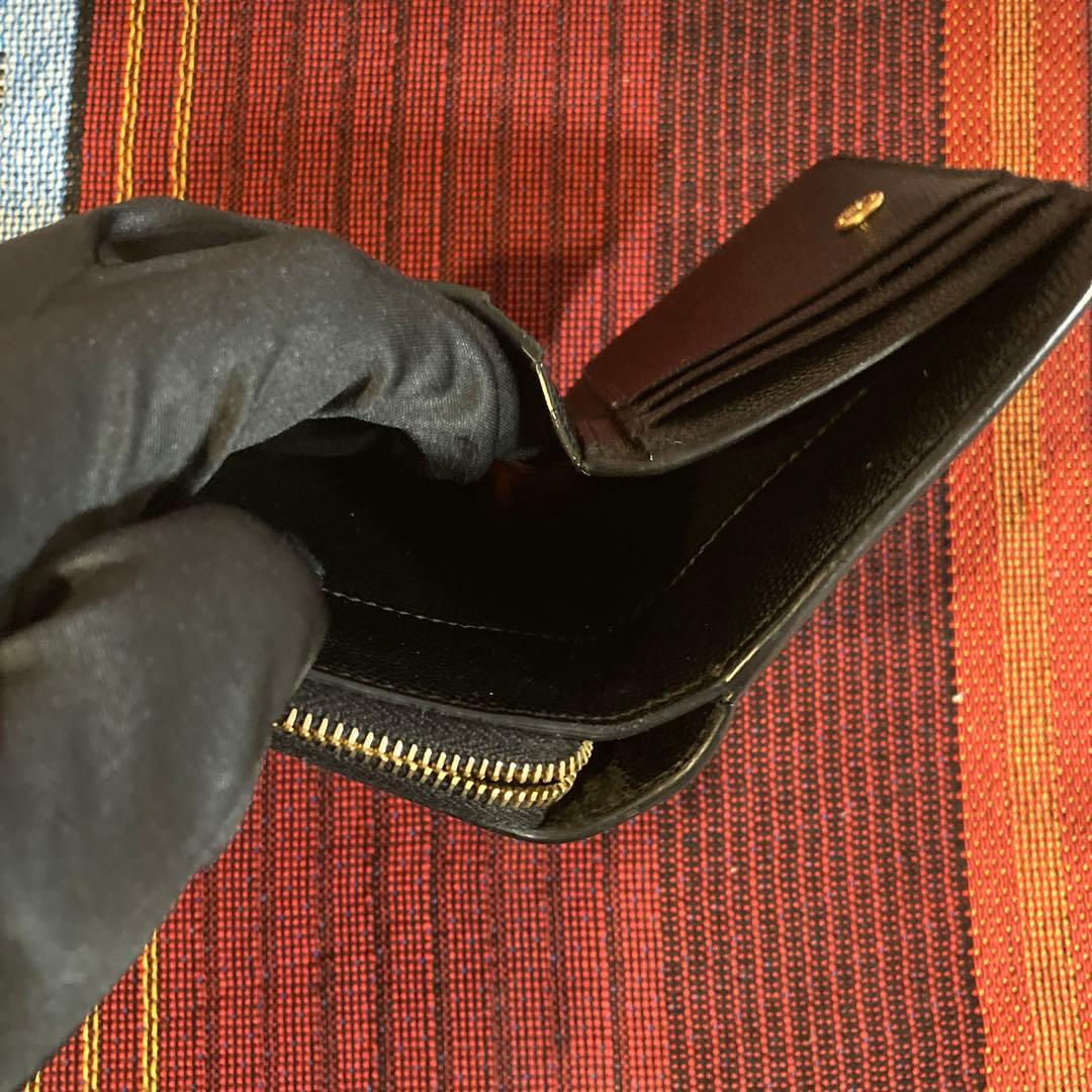 サンローラン 折り財布 ラウンドファスナー カサンドラ ロゴ 総柄