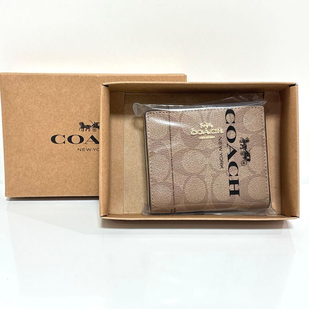✨新品未使用✨COACH コーチ 二つ折り 財布 ブラウン