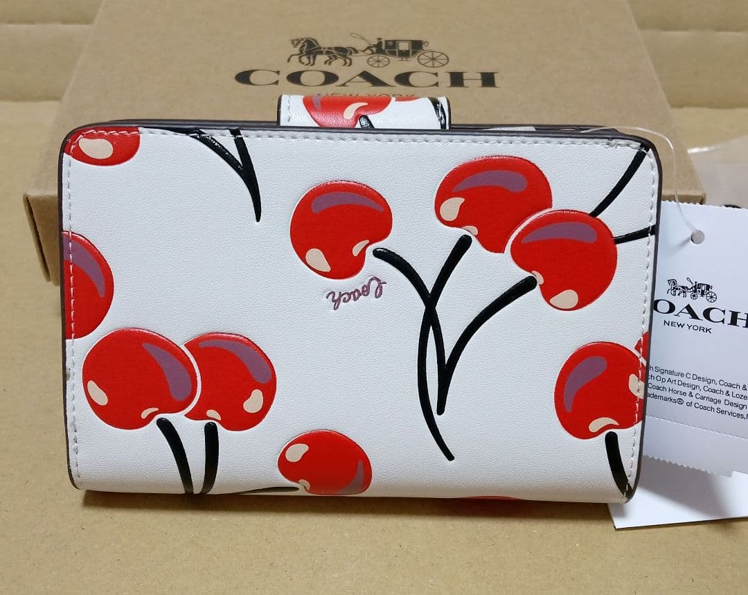 【オープン価格】COACH チェリー柄 二つ折り財布