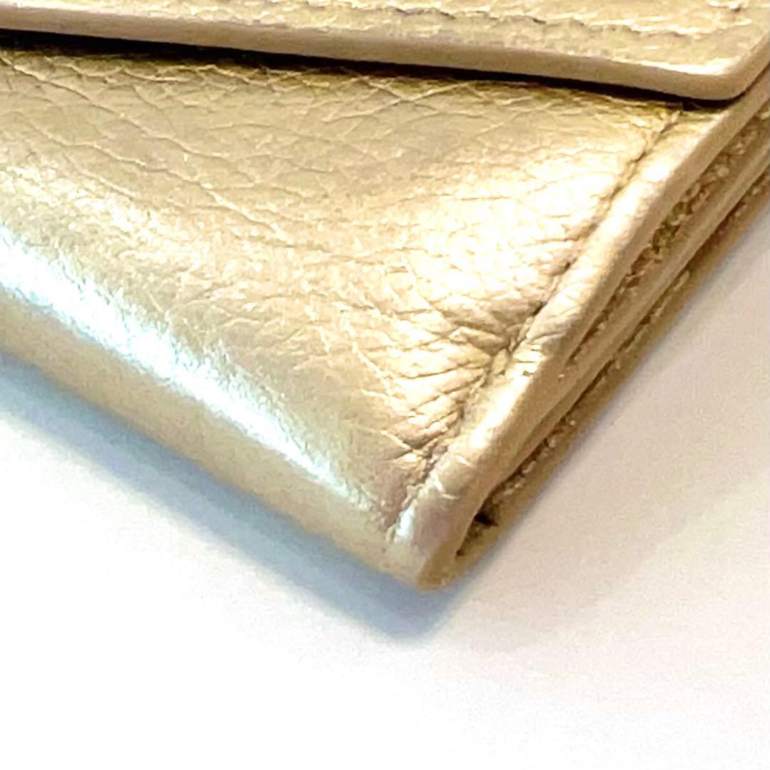 ルイヴィトン ポルトフォイユ ロックミニ 折り財布 ゴールド M69059