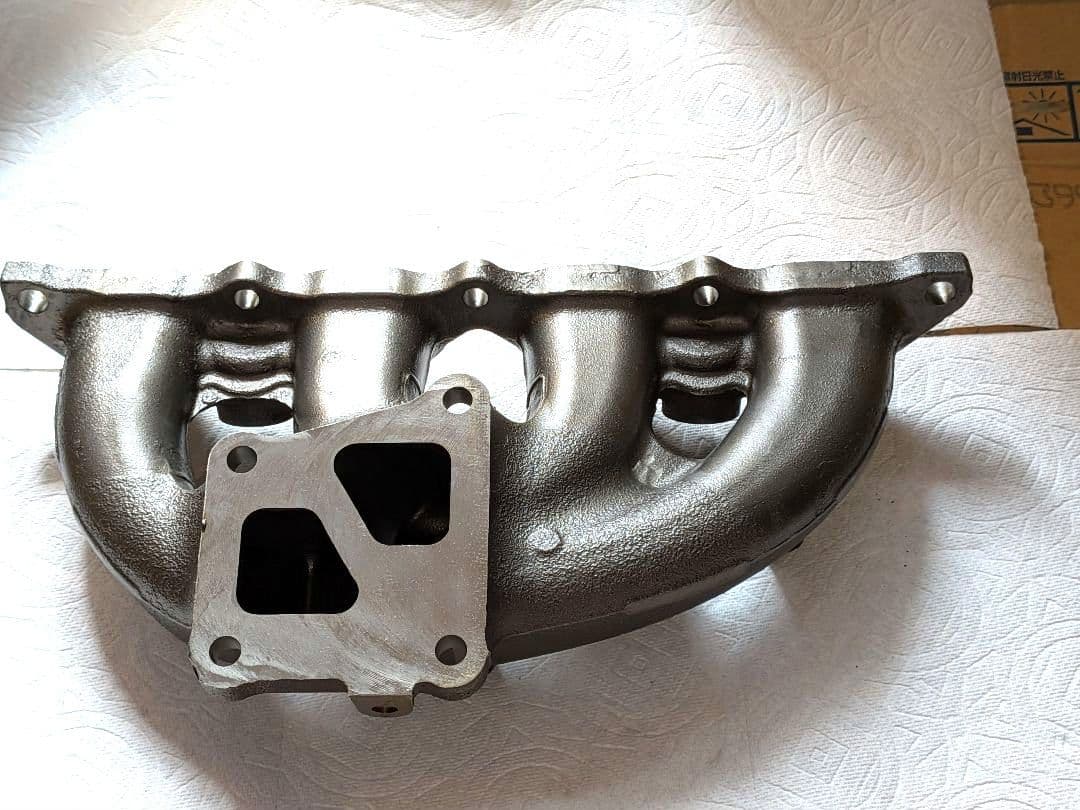 新品！ 半額以下！ランサーエボリューション8 エキゾーストマニホールド 純正品