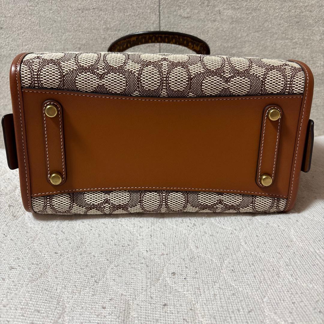 【お値下げ中】COACHローグ25 シグネチャーテキスタイル ハンドバッグ