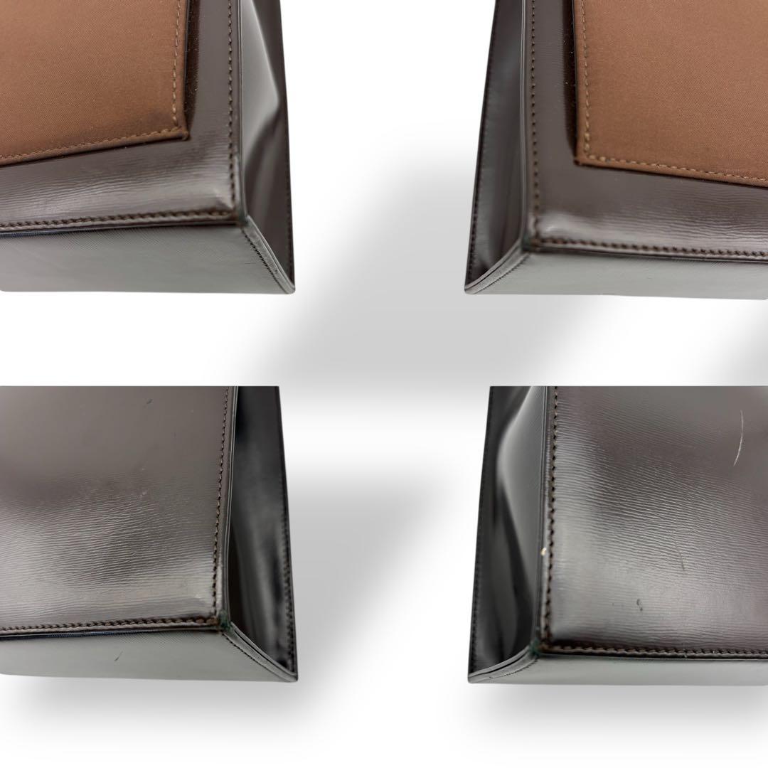 イヴサンローラン ハンドバッグ トート 腕掛け レザー 茶 ブラウン 型押しロゴ