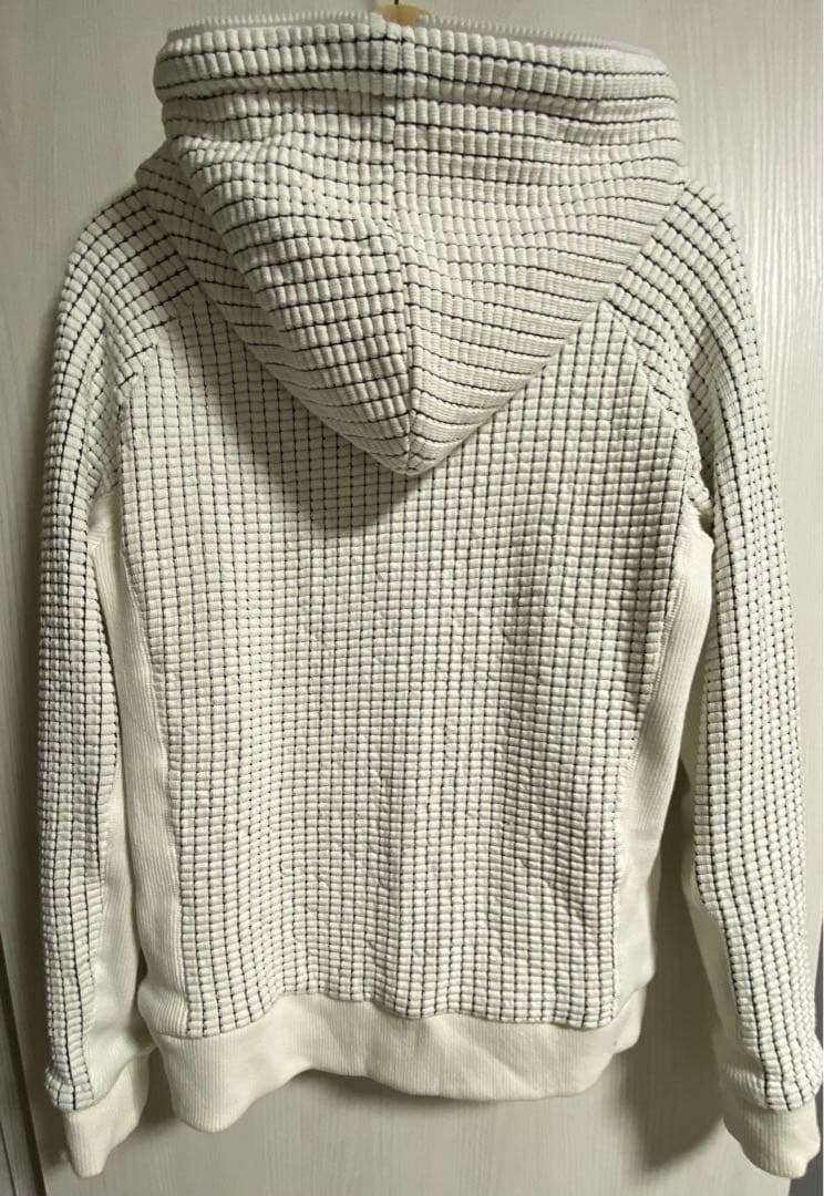 1PIU1UGUALE3 RELAX ランダムロゴワッフルリブパーカー