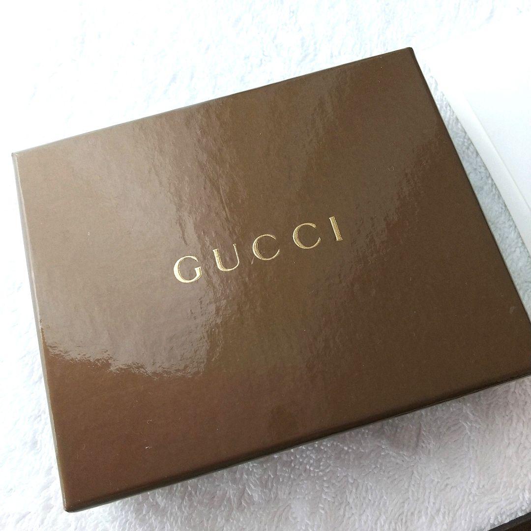 【新品 】 グッチ ストラップ GUCCI 筆記体ロゴ レザー 廃盤 ゴールド