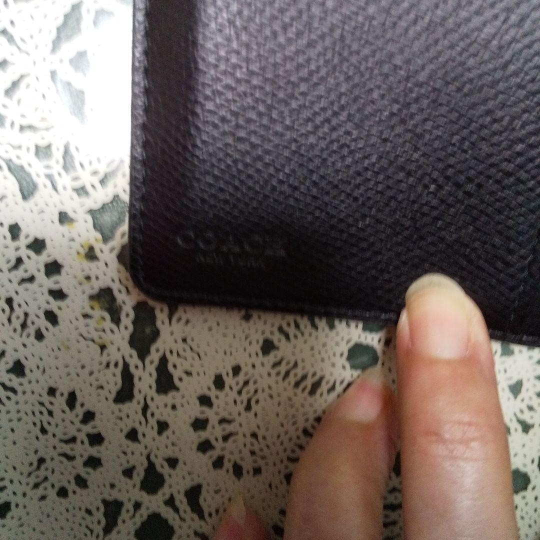 正規品❗️COACHブラックレザー 二つ折り財布 ❣️美品。ゴールドロゴ
