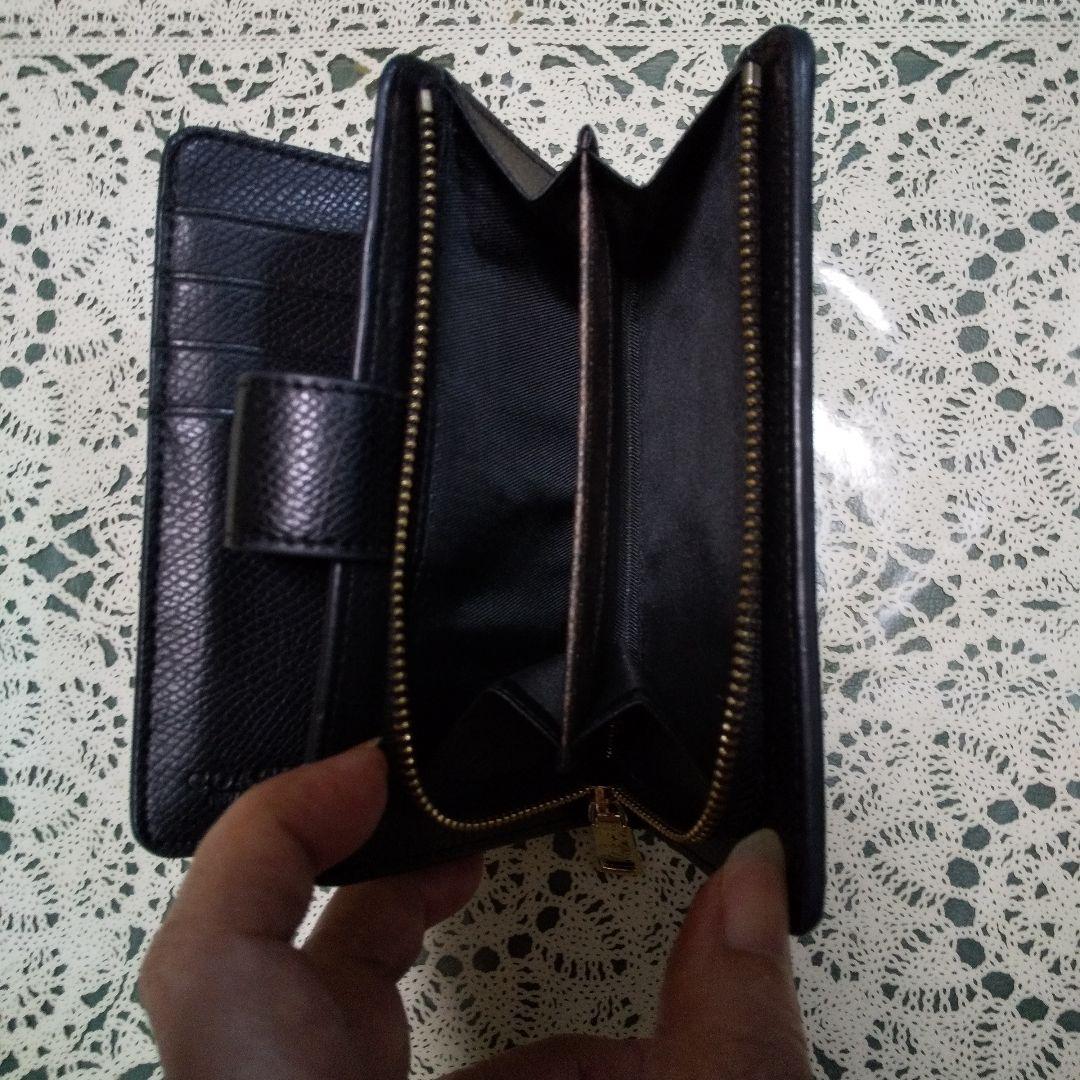 正規品❗️COACHブラックレザー 二つ折り財布 ❣️美品。ゴールドロゴ