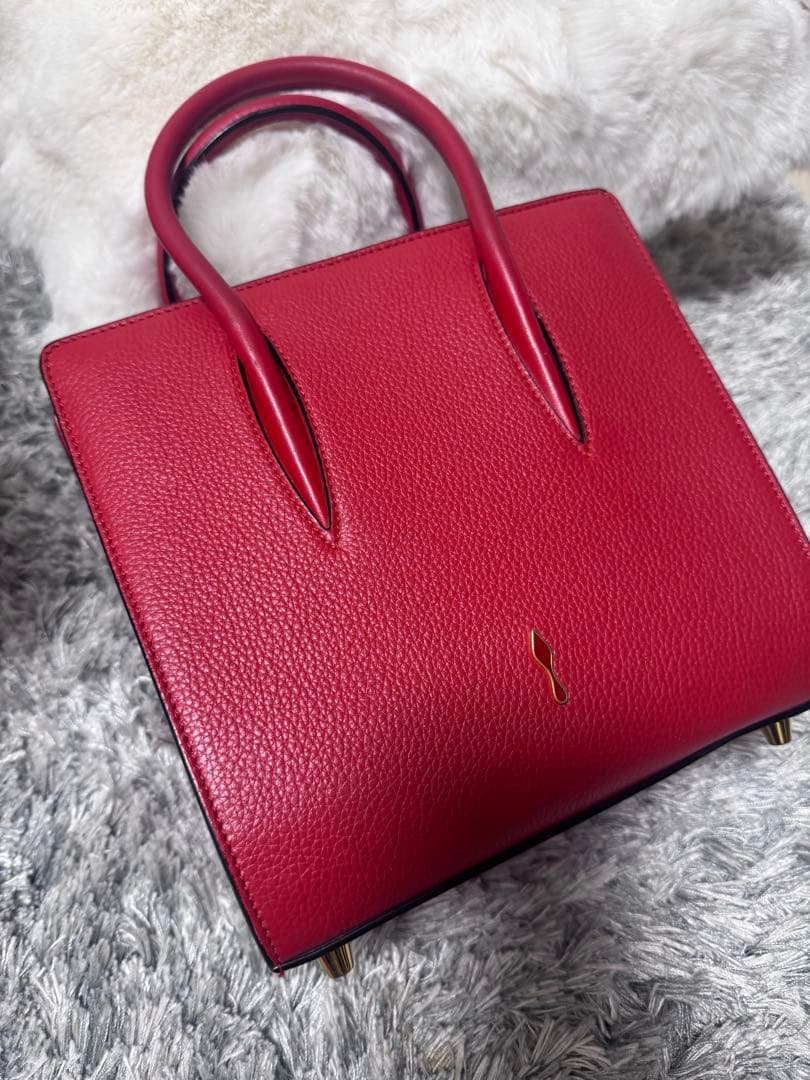 クリスチャンルブタン スタッズ付き赤レザーハンドバッグ