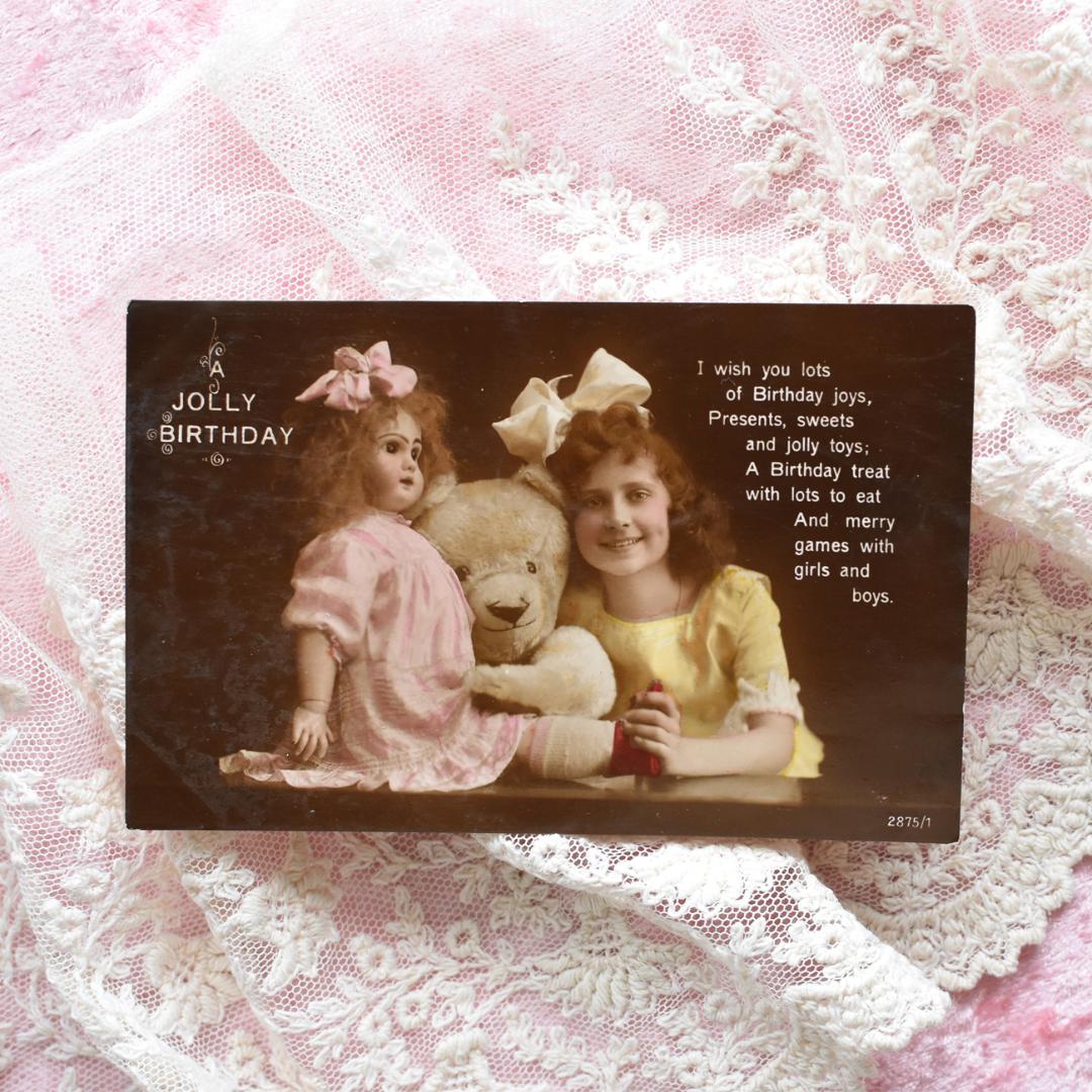 *アンティークポストカード　お人形とテディベアと仲良しな少女*