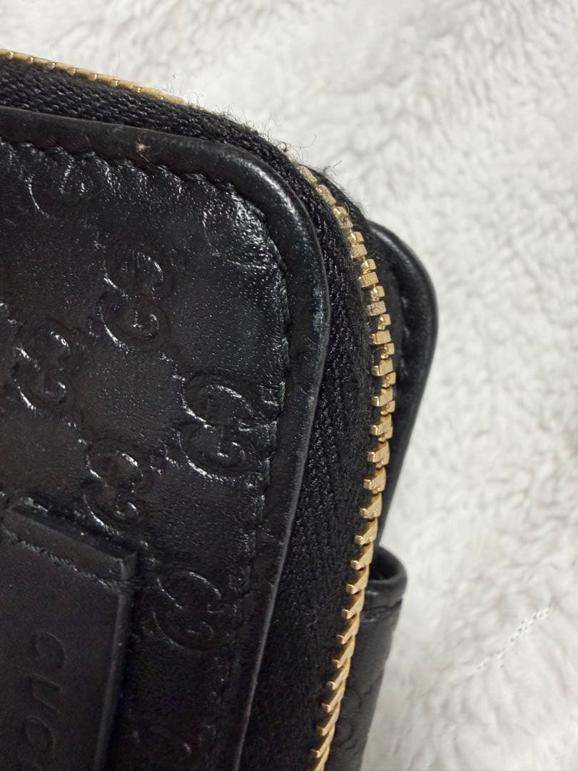 未使用GUCCI 二つ折り財布 ロゴプレート マイクロGG シマレザー 黒