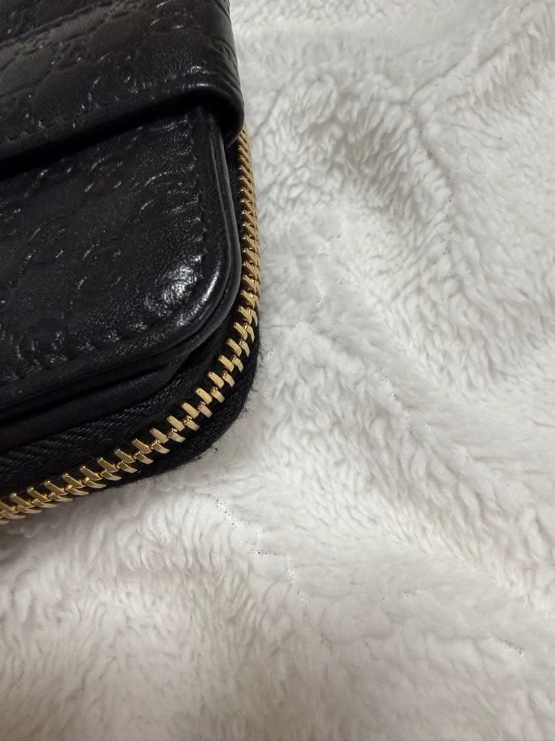 未使用GUCCI 二つ折り財布 ロゴプレート マイクロGG シマレザー 黒
