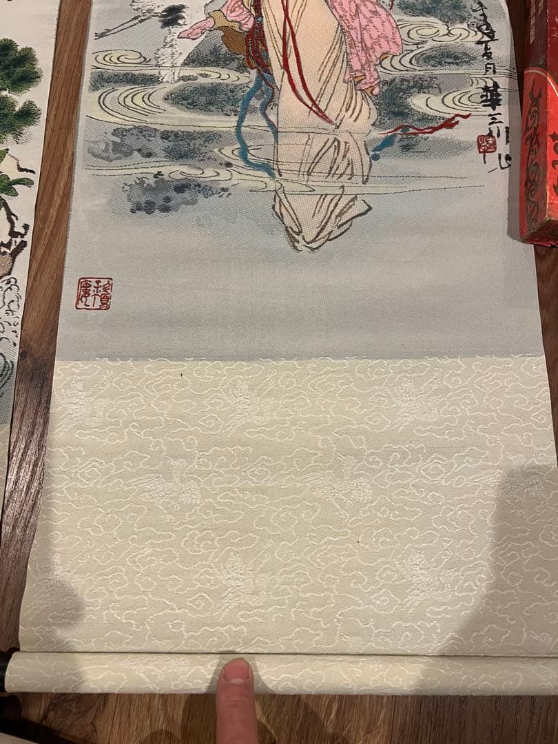 華三川が制作した『麻姑献寿』の絹織り絵で、杭州絹織工芸廠によって製造されたもの