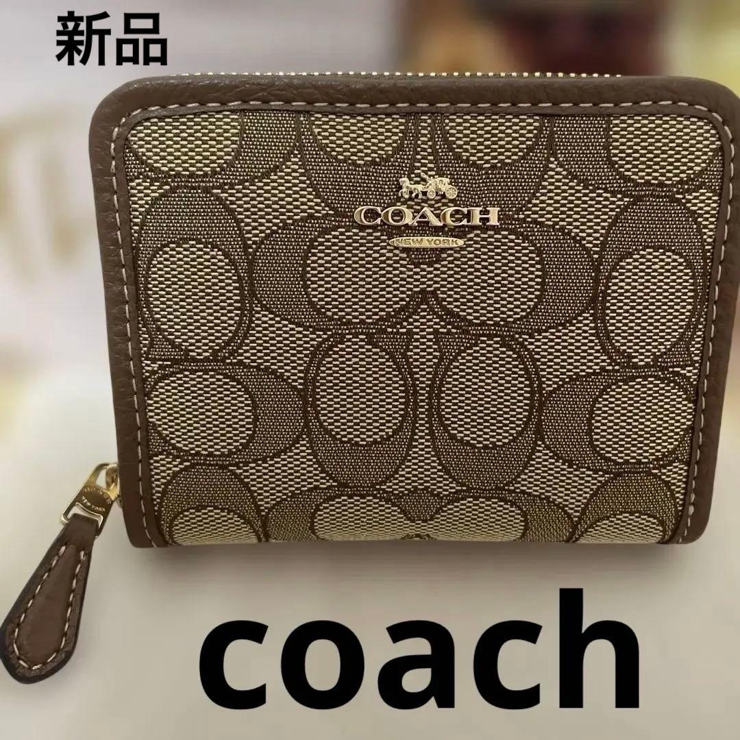 新品 COACH 二つ折り財布 ブラウン