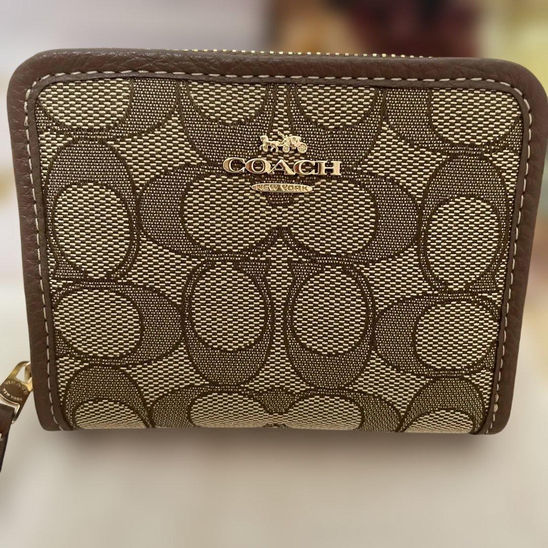 新品 COACH 二つ折り財布 ブラウン