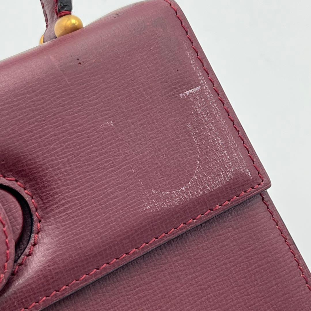 カルテイェ マストライン ターンロック ボックスカーフ ミニハンドバッグ 総柄