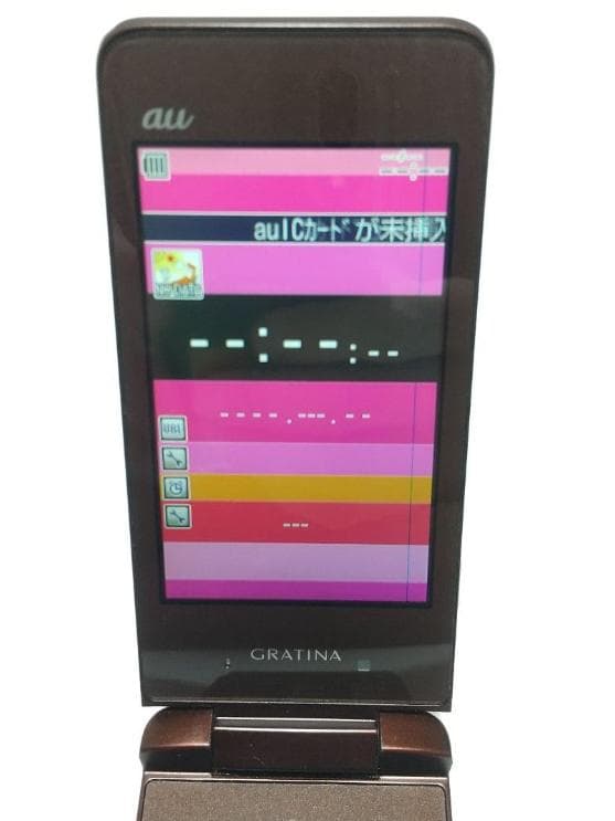 GRATINA KYY06 折りたたみ式携帯電話 オレンジ