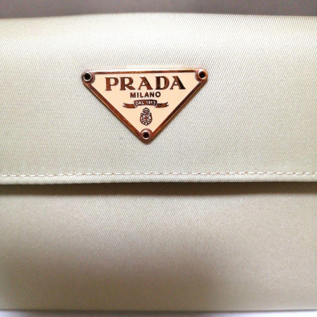 【未使用美品】 PRADA 三つ折り財布 テスート ゴールド ベージュ 三角ロゴ