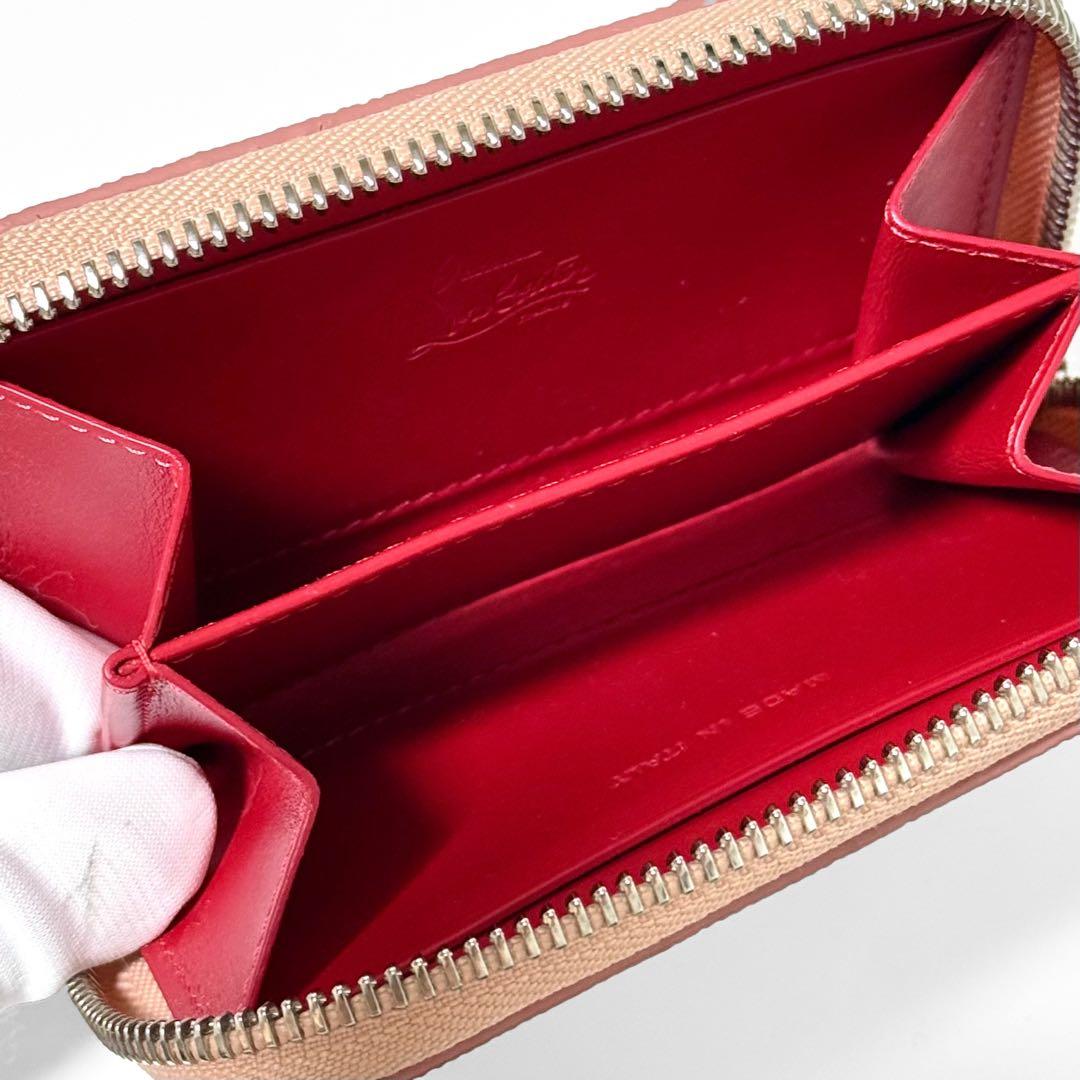 クリスチャンルブタン パネトーネ ケース デニム スタッズ ラウンドジップ