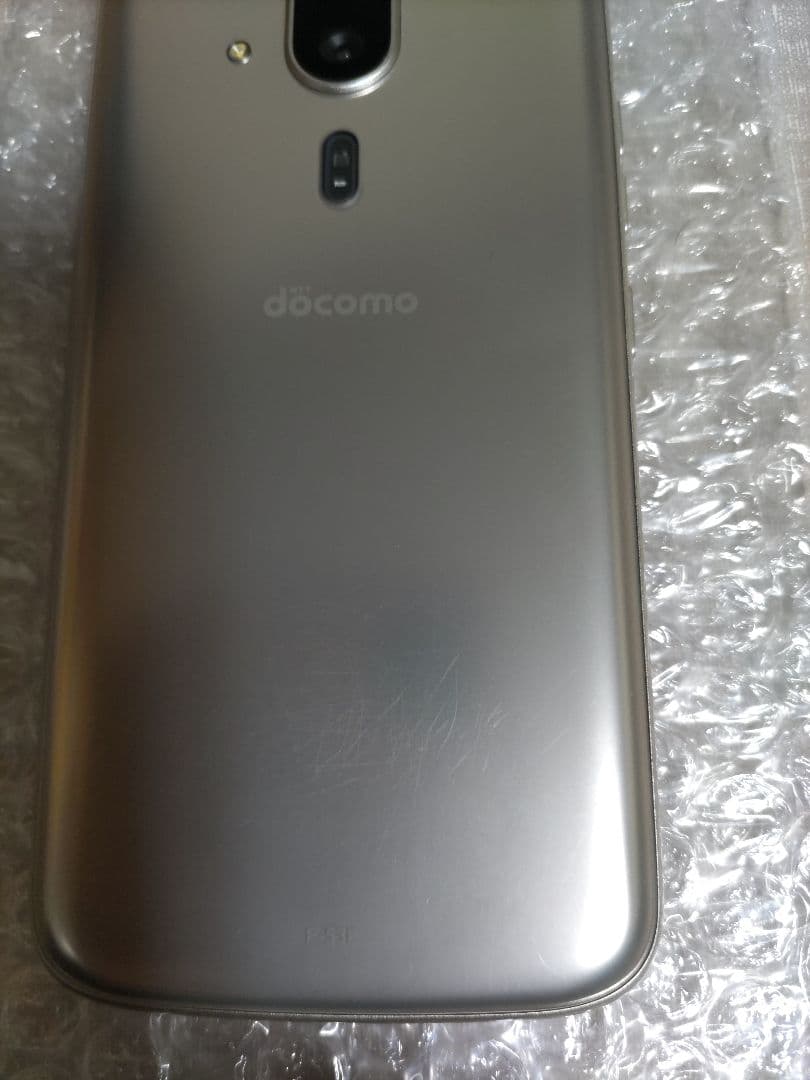 らくらくスマートフォン F-53E ゴールド 新品ケース、フィルム付き