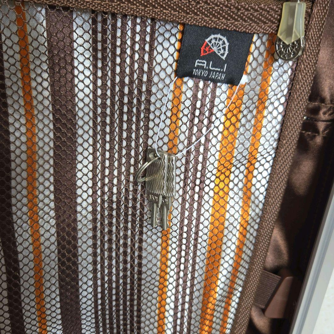 7/12迄A.L.I GRAVID-ZERO大型スーツケース4輪黒ハードイケかる