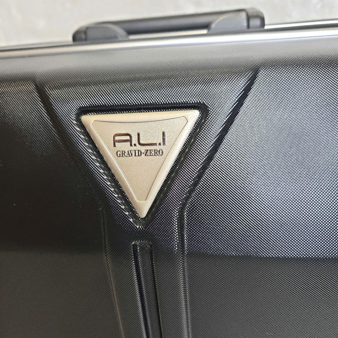 7/12迄A.L.I GRAVID-ZERO大型スーツケース4輪黒ハードイケかる