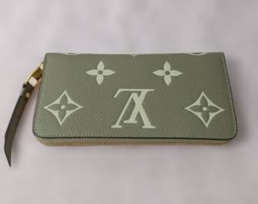 美品 M69794バイカラー 長財布 トゥルトレール クレーム