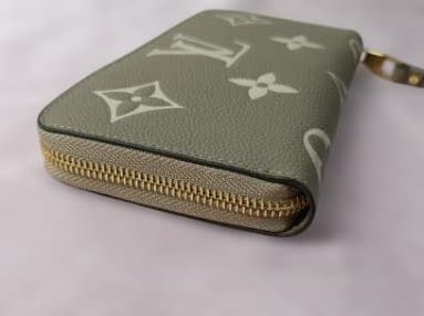 美品 M69794バイカラー 長財布 トゥルトレール クレーム