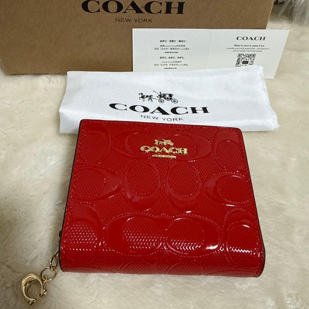 COACH 赤 エナメル 二つ折り財布