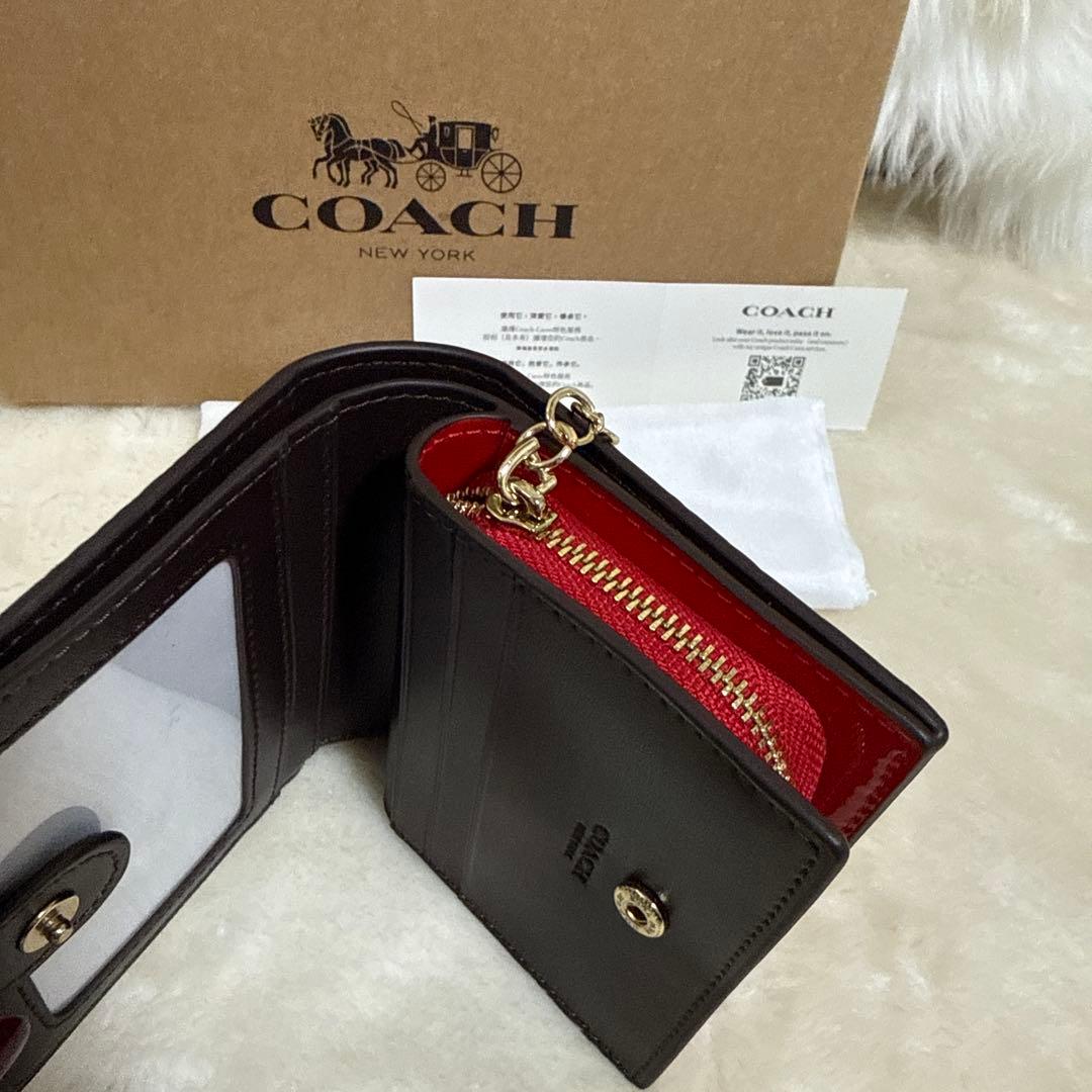COACH 赤 エナメル 二つ折り財布