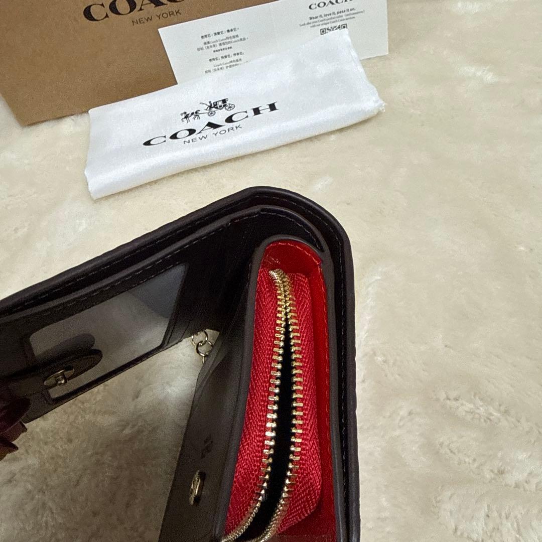 COACH 赤 エナメル 二つ折り財布
